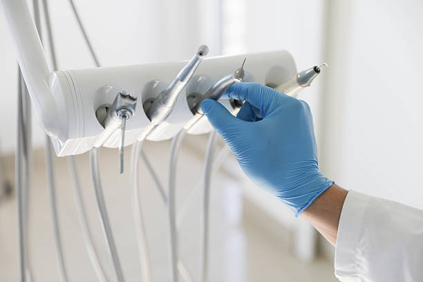 Professional Tooth Extraction technician working in Ricardo, TX